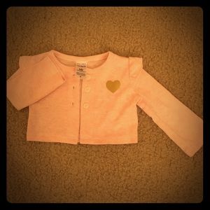 Pink cardigan with gold heart